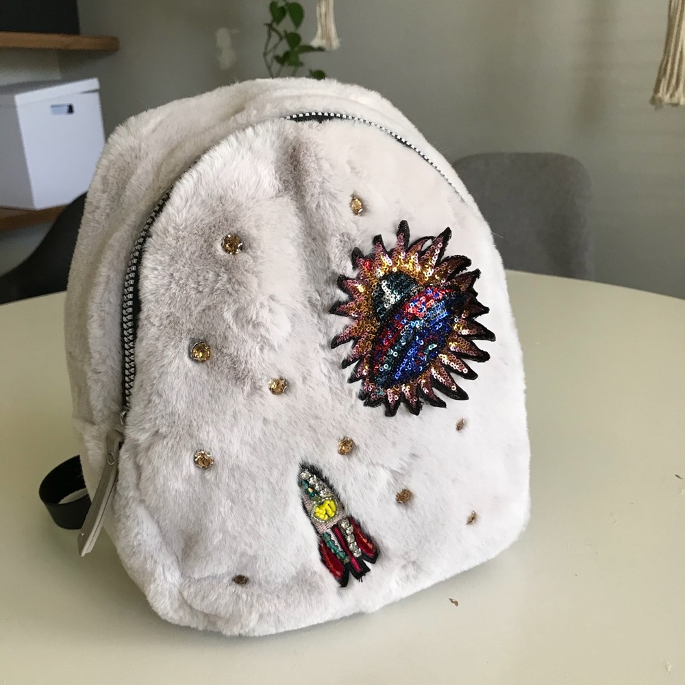 Furry small backpack for girls with patches